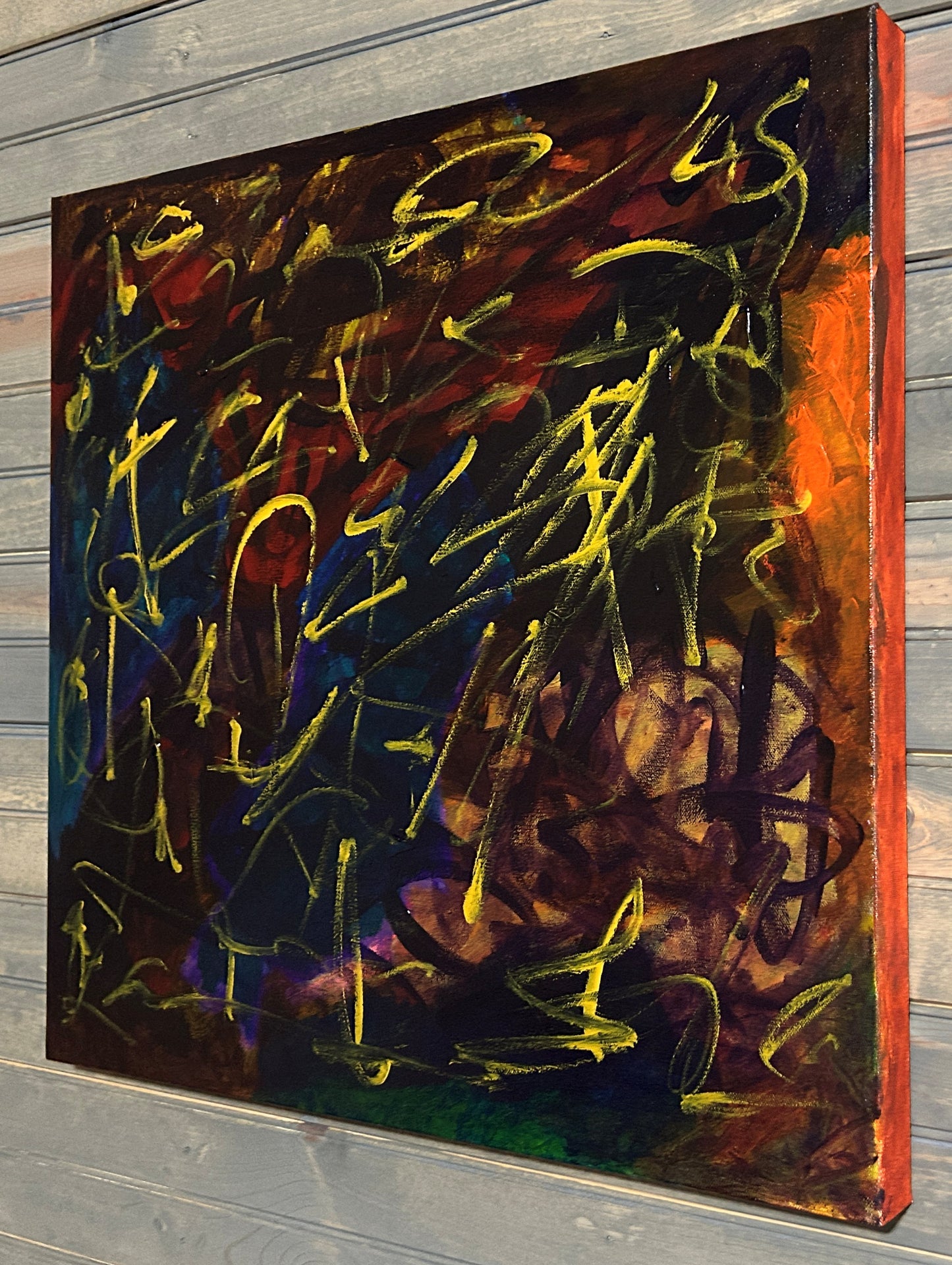 Abstract painting with bold strokes on a wooden panel