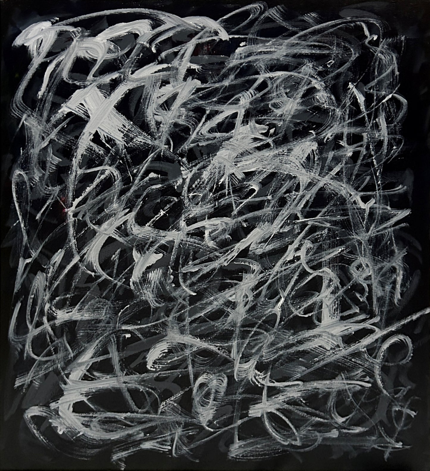 Abstract black and white art on a dark background
